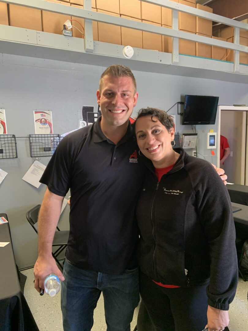 A man and woman standing next to each other.